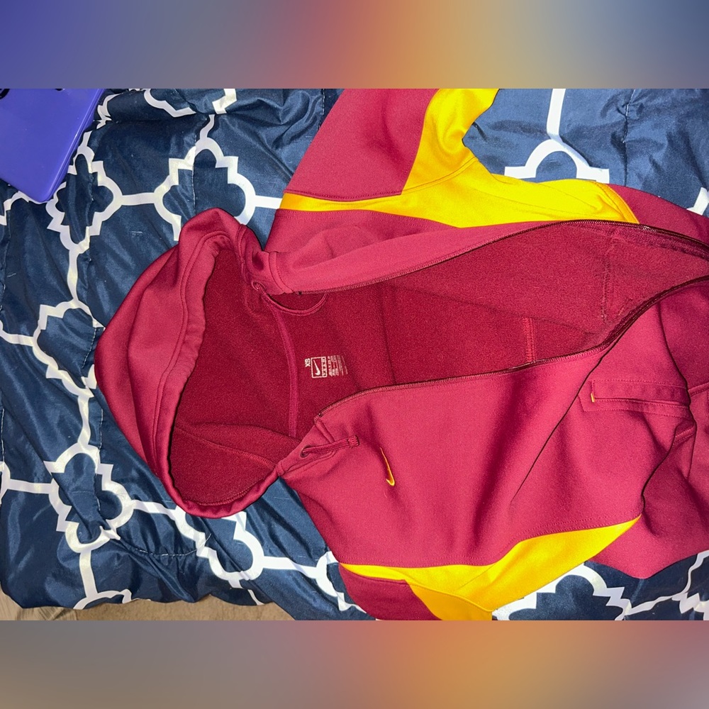 Red and yellow Nike zip up